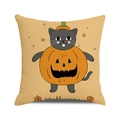 Close-up of linen cushion cover featuring a grey cat in a pumpkin for Halloween - Jack-o-lantern Grey Cat