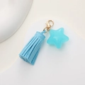 Blue star pendant keychain with velvet tassel and golden clasp on white background - Blue with Blue Star