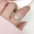Minimalist S925 sterling silver ring featuring a twisted band and solid heart design - Heart