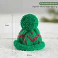 Mini knitted green Christmas hat with red wave pattern for festive tree decoration - Knitted Green Hat
