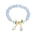 Light blue beaded bracelet with ice-crack texture, floral charm and golden chains - S015-blue Fresh Floral Bracelet #sz173