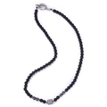 Close-up of 6mm black stone beads necklace featuring a metal square pendant and OT clasp - Black Magnetic Stone Necklace