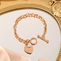 Bracelet à maillons en acier rose doré avec charms double cœur et fermoir OT - 7737 Bracelet Cœur Étincelant / Or rose
