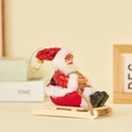 Plush Santa Claus on wooden sleigh ornament with red sequin plaid outfit and glasses - Sled Style (Red Patch)