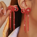 Sparkling red rhinestone bow drop earrings with long tassels in a luxury finish - Stud Earrings / Electrophoretic Red