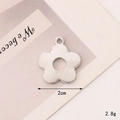 Detail view of a 2cm silver flower pendant showing its 2.8g weight and polished metal finish - C321 20mm Silver Five-Petal Flower