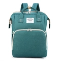 Multifunctional teal diaper backpack with USB port and top handles in a sleek design - Green