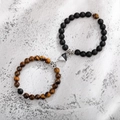 Detail of natural stone couple bracelets with magnetic heart clasp and silver spacer beads - Tiger Eye Black Matte Heart B&W