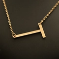 Minimalist gold-plated stainless steel necklace with horizontal uppercase letter T pendant - Gold T
