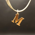 Golden flat snake chain necklace featuring a minimalist capital letter M pendant - Letter M (5592272000733)