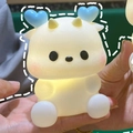 Portable cartoon night light with blue heart ears held in hand for kids - Little Dragon Blue Horns
