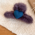 Detail view of plush autumn hair claw clip with purple faux fur and blue heart decoration - Purple Flower Hair Claw