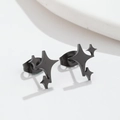 Vista de detalle de pendientes de estrella negros mate de estilo minimalista moderno - Negro