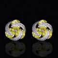 Fashionable floral swirl stud earrings with yellow cubic zirconia and silver base - Yellow