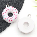 DIY donut resin pendant with colorful sprinkles and white base on a silver jump ring - White Donut