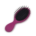 Portable pink air cushion massage comb with round teeth for scalp care on white background - Sunset Red