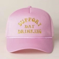 Close-up of pink trucker hat featuring yellow Support Day Drinking embroidery - One Size / Pink with Yellow Logo