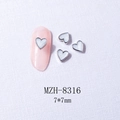 Macro shot of white heart nail charms with silver edging and size specifications - 8316 Silver Border White Heart (7*7mm)