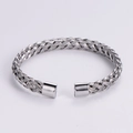 Bracciale rigido a cavo intrecciato in acciaio inossidabile argento con terminali lucidi - Color Acciaio