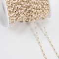 DIY jewelry chain with square pink beads and gold metal round beads on a spool - Cream White KC Gold (Square Beads)