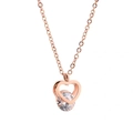 Collar con colgante de corazón de acero de titanio oro rosa con cristal sobre fondo blanco - Oro rosa