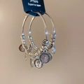 Macro shot of vintage silver geometric hoop earrings with portrait coin pendants and tassels - Coin Hoop Style / 925 Silver Earring Post / Silver (Small Size)
