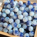 Blue and white 10mm marbled glass beads for DIY jewelry making in a wooden bowl - 10mm / Cool Purple