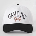 Detail of GAME DAY embroidery and brown bow on black and white canvas baseball cap - Adjustable / White and Black Splicing