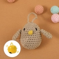 Handmade crochet baby rattle toy in a cute yellow chick design for infant soothing - Bird
