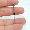 Titanium industrial barbell earring featuring a center-set round black zircon stone - Black Zirconia