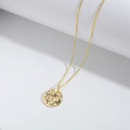 Elegant gold clover necklace with colorful zircon stones in a circular pendant - Round