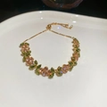 Adjustable gold bracelet with green marquise-cut and champagne round-cut zircons - Olive Green