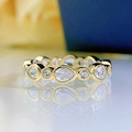 Elegant gold pear-shaped and round zircon eternity ring with a mirror reflection - US 7 / Gold