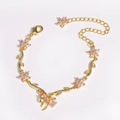 Bracelet luxueux plaqué or avec fleurs en zircon rose et nœud étincelant en cristal - Or Rose