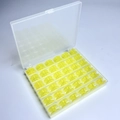36 Yellow Bobbins In A 36-compartment Box / Shuttle Core Storage Box