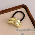 Elastic hair tie featuring a curved geometric gold metal plate with mirror finish - Large Double-Bar Smooth Gold