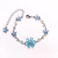 Floral copper bracelet with sky blue pear-cut gems and adjustable lobster clasp - Sea Blue-White Gold