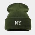 Detailed view of the olive green knitted beanie with white NY embroidered logo - Army Green