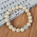Handgefertigtes Bodhi-Samen-Armband mit einer grünen Jadeperle im Zen-Stil für Damen - Goldfaden Bambus 10mm + Leuchtend