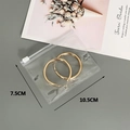 Detailed view of 7.5x10.5cm transparent PVC zipper bag holding gold hoop earrings - 25 Silk 7.5*10.5cm (100 Pcs)