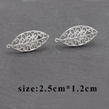Silver leaf-shaped hollow filigree earrings component in metal, size 2.5cm by 1.2cm - Silver Hollow Leaf Style (M60018)