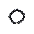 Detailed close-up of 4mm black stone elastic bead ring with a single silver accent bead - Black Agate