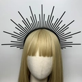 Detailed front view of black spiked halo crown headpiece with radiant sunburst design - Style 2