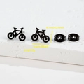 Macro shot of black stainless steel bicycle earrings with size dimensions 0.7x1cm - 004 Black Bicycle