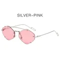 Randloze geometrische zonnebril met roze glazen en slanke zilverkleurige metalen poten - Zilveren Frame Roze Glazen