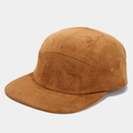 Detail view of caramel brown faux suede texture and ventilation eyelet on the baseball cap - Adjustable / Camel