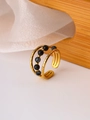 Macro detail of gold-plated open ring with double-layered band and black natural stone beads - Adjustable Open / Black