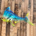Artistic metal shark bone wall decor with blue-green-yellow gradient on wood background - 25cm / Mahi-Mahi
