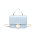 Quilted light blue leather crossbody square bag with gold circular lock and chain strap - Blue