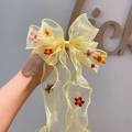 Pale yellow oversized mesh bow hair clip featuring delicate felt flower embroidery - Yellow